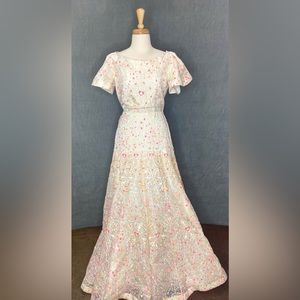 Stunning hand crafted embroidered ivory gown by Manish Arora.